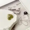 Botón metálico en forma de corazón suéter tejido traje cárdigan abrigo de lana estilo Chanel hebilla de ropa