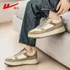 Zapatos de tirar zapatillas de hombre otoño 2026 modelo nuevo cuero impermeable moda versátil zapatos deportivos zapatos casuales para hombre