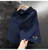 Pantalones Cortos Deportivos Casuales de Gasa Burbuja Adelgazantes de Longitud hasta la Rodilla para Hombre, Estilo Coreano Perezoso Bordados de Perro Pequeño, Verano 2026, Delgados, de Secado Rápido