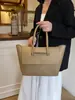 Bolso tote de tapa abatible, de alta gama, minimalista para mujer, nueva colección otoño/invierno 2026, versátil, estilo retro, gran capacidad, adecuado para ir al trabajo.
