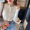 Suéter de punto de cuello redondo para mujer, nuevo estilo de otoño e invierno, ropa interior elegante para otoño e invierno, diseño de camiseta base con sentido de diseño, suéter de nicho, color albaricoque