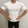 Gimnasio Estilo Americano Verano Nuevo Camiseta Ajustada para Hombre Pantalón Jogger Deportivo Fitness Running Entrenamiento Camiseta de Manga Corta de Secado Rápido
