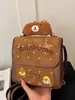 Bolsas de mujer transfronterizas, nueva colección otoño/invierno 2026: mochilas de moda y con estilo con una estética preppy, que presentan un lindo bordado de oso