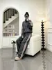 Conjunto deportivo casual estilo europeo para mujer, moda otoño e invierno 2026, corte ajustado, sudadera con bloques de color y pantalón ancho conjunto de dos piezas