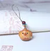 Llavero creativo con diseño del zodiaco tallado en madera de tuya, colgante para teléfono móvil para hombres y mujeres, artesanías generales al por mayor.