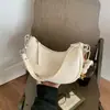 Bolsa Vintage de Axila de Alta Qualidade para Mulheres 2026 Nova Bolsa de Nicho em Forma de Meia-Lua Bolsa de Ombro Transversal Fashion para o Dia a Dia com Pingente
