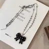 Colar de Pérolas com Laço de Bolinhas Pretas Coreano Corrente Longa para Suéter Feminino Design de Nicho Acessórios Versáteis