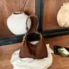 Bolsa Feminina Elegante Versátil Cor Sólida 2026 Nova Estilosa Retrô Grande Capacidade Moda Nicho Personalidade Bolsa Tote de Ombro