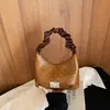Bolso pequeño súper popular para el trabajo, nuevo bolso cruzado de moda de verano 2026 para mujer, de lunares, de nicho, único