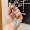 Chaveiro de Pingente de Concha Luminosa Simulada Acrílica Transparente Transfronteiriço para Casal Chaveiro Feminino Joias Atacado