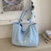 Bolso grande de gran capacidad y ligero para mujer, nuevo modelo de verano 2026, bolso de mano casual de moda para la escuela y el trabajo, bolso de hombro grande