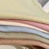 Camiseta Básica de Algodón Transpirable con Jacquard de Corazones Clase A para Niños Cuello Redondo Manga Corta Color Caramelo Nuevo 2026 para Niños y Niñas