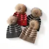 Gorro de cachemira para mujer 100% cachemira pura otoño e invierno nuevo estilo moda femenina casual suave pegajoso protección para las orejas gorro a rayas con pompón