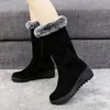 Botas gruesas de media pantorrilla, botas de nieve antideslizantes para mujer, nuevo estilo de invierno 2026, botas de algodón forradas de felpa, de suela plana, con un ligero tacón, botas de algodón grandes para la región noreste