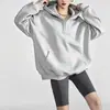 Moda femenina transfronteriza europea y americana 2026 estilo ins sudadera con capucha de manga larga de color liso versátil holgada con media cremallera y bolsillo