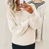 Suéteres de punto de color liso europeos y americanos de Amazon transfronterizos para mujer, nuevo suéter de punto de cuello redondo de manga larga de otoño e invierno, versátil