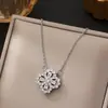 Novo Colar de Trevo de Quatro Folhas Estilo Coreano com Zircônia Microincrustada em Aço Titânio para Mulheres, Banhado a Cobre com Ouro Real, Corrente de Clavícula Tendência