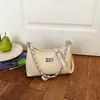 Bolso de cadena pequeño de nicho coreano para mujer, nuevo modelo 2026, bolso cruzado de moda versátil de alta gama para el día a día, bolso de hombro