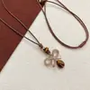 Colar estilo retro francês com estética Melard, perfeito para o dia a dia, oferecendo um visual sofisticado e estiloso, uma peça moderna e luxuosa, e uma corrente de suéter única