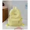 Mochila de viaje simple con estampado de letras estilo dulce transfronterizo para niñas, modelo nuevo para estudiantes de secundaria y preparatoria, mochila de color sólido para la escuela
