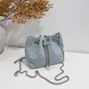 Nuevo bolso de mano estilo lujo con un diseño chic y elegante, con cierre de cordón y forma de cubo, perfecto para mujeres en la temporada de otoño 2026 - un bolso cruzado de alta gama y moderno