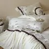 Juego de cuatro piezas estilo francés vintage de alta gama 100S bordado floral 100% algodón cepillado, engrosado para otoño e invierno, con ribete de encaje, algodón puro y ropa de cama cálida