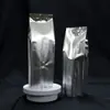 Bolsas de aluminio selladas al vacío de tamaño mediano con válvulas de aire, adecuadas para café y frutos secos, con un diseño de sello de ocho lados, y disponibles para impresión a color en lotes pequeños