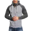 Nuevo cárdigan suéter deportivo con forro polar de combinación de colores para hombre europeo y americano, moda casual, talla europea, abrigo de manga raglán