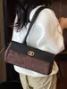 Bolso de hombro de retazos de mezclilla minimalista de diseño único, bolso de mano a cuadros versátil y moderno, bolso de axila para el día a día con cordón
