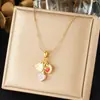 Corrente de Clavícula Multi-Elemento Mais Vendida Transfronteiriça Aço Inoxidável Banhado a Ouro Pingente de Flor com Gotejamento de Óleo Coração Doce Colar de Acessório para Mulheres