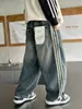 Pantalones vaqueros de pierna ancha para niño 2026 estilo primavera/otoño holgados rectos modernos casuales para niños mayores moda pantalones largos