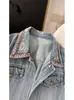 Jaqueta Jeans Feminina Retrô de Manga Longa Nova para a Primavera de 2026 Curta Fashion Lavada Vintage Lapela Emagrecedora