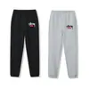 Pantalones joggers Stussy negros con estampado de dados de ocho letras, estilo nuevo transfronterizo, corte holgado, pantalones deportivos, pantalones largos, unisex