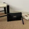Bolso de Hombro/Mano para Mujer 2026 PU Color Sólido con Lazo Estilo Coreano Diseño de Moda Tendencia Color Sólido Sobre Bolso de Mano
