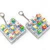 Navidad 9 Teclas Alivio del Estrés Botón Luminoso Juguete para Aliviar el Estrés Keycap Llavero Teclado DIY Juguete para Aliviar el Estrés Colgante