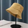 Chapéu de Pescador de Aba Larga Feminino Primavera e Outono Chapéu Bordado com Ilhós Atacado Cor Sólida Versátil Proteção Solar Chapéu Balde Respirável Fabricante