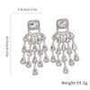 Pendientes de Aguja de Plata Transfronterizos con Borlas Cuadradas de Gota de Agua Incrustadas de Diamantes, Pendientes Sencillos y de Moda con un Diseño de Lujo Ligero y de Alta Gama
