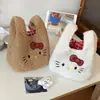 Bolsa de muñeca de lana de cordero al por mayor, bolso de mano para mujer, bolso tote, adecuado para el trabajo y los desplazamientos, bolso tote pequeño, diseño lindo de gato de dibujos animados