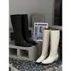 Pele de ovelha de alta qualidade 2026 outono e inverno novo estilo minimalista francês retrô botas longas que aumentam a altura para mulheres