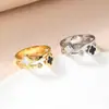 Anillo Doble de Trébol de Cuatro Hojas Blanco y Negro Acero de Titanio Diamante Micro-engastado Chapado en Oro Anillo Abierto