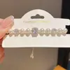 Pulsera de Perlas y Circonia Cuadrada Chapada en Oro Real de 18k Anillo de Mano de Lujo Ligero y Alta Gama Joyería de Mano Moderna y Versátil para Mujeres