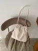 Bolsa nuvem plissada feminina 2026 novo estilo moderna textura retrô bolsa de ombro única sensação de alta qualidade para o dia a dia bolsa tiracolo tipo balde