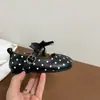 Zapatos bajos de cuero con punta dividida sintética, zapatos planos de ballet con lazo de encaje decorado con lunares estilo francés, principios de otoño 2026