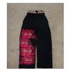 Pantalones de Pierna Ancha Falsos de Dos Piezas de la Nueva Serie Trendy 'Spray-Painted' para Adolescentes y Parejas Hip-Hop Pantalones de Doble Capa Venta al por Mayor