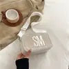 Bolsa de câmera retrô texturizada feminina de palha trançada para primavera e verão, bolsa de ombro fashion 2025, nova, com alça de ombro larga, bolsa transversal tipo caixa