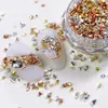 Lujo Ligero Diamante Brillante Cristal de Hielo Piedras Trituradas Piedras Pequeñas Decoraciones para Uñas Venta Caliente Coloridos Irregulares Materiales Minerales Triturados