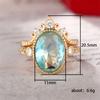Anillo de lujo Cao Shi con diseño transfronterizo europeo y americano, corona dorada y circón azul ovalado para mujer