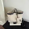 Moda Estilo Coreano 2026 Chegada de Verão Bolsa de Mão para o Trabalho e Deslocamento Bolsa de Ombro Personalidade Simples Elegante Casual Bolsa de Ombro