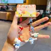 Llavero Colgante Auténtico de Dibujos Animados Sanrio Gato KT Cinnamoroll para Parejas, Accesorio para Bolso, Llavero, Adorno de Muñeco