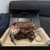 Otoño 2026 Nuevo Estilo Bolsa Tote Pequeña para el Trabajo y el Trayecto Diario Bolso Cubo de Cadena Individual para Hombro Cruzado para Mujer Bolsas para Mujer al por Mayor